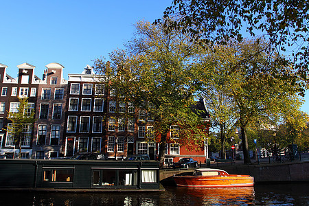 宁静的阿姆斯特丹运河和家用船联盟自行车商务房子假期历史特丹历史性旅行建筑学图片