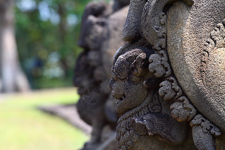 印度尼西亚日惹博多布杜尔寺石头世界装饰品日落浮屠建筑学佛教徒游客旅行雕像图片