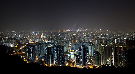 晚上在香港市中心与高楼大楼场景办公室建筑住房公寓顶峰景观城市民众天线图片