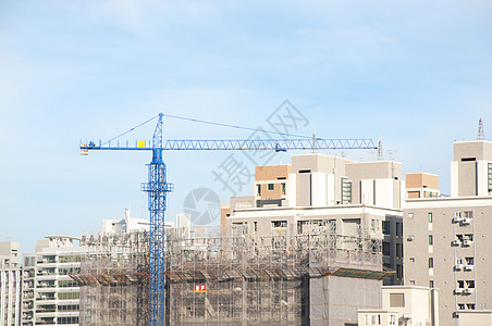 建筑施工水泥天空生长脚手架蓝色项目城市建筑学进步房子图片