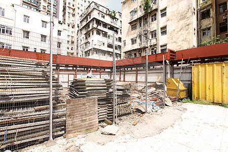 香港的建筑工地脚手架蓝色起重机街道构造职业机器进步天空安全图片