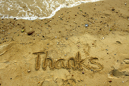 感谢沙子上的话想像力太阳绘画英语假期划伤海洋手绘支撑海滨图片