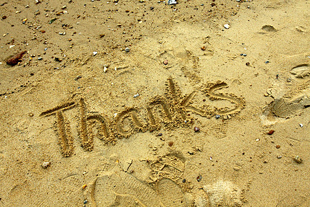 感谢沙子上的话太阳手绘支撑感激雕刻字体想像力粮食旅行语言图片