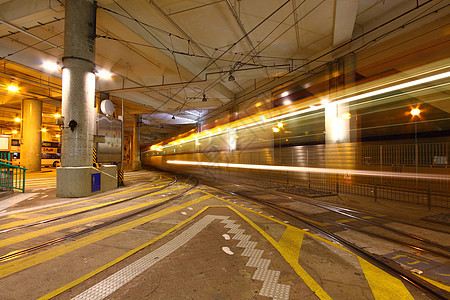 香港夜间的轻型铁路场景运输辉光市中心城市交通旅行驾驶线条运动图片