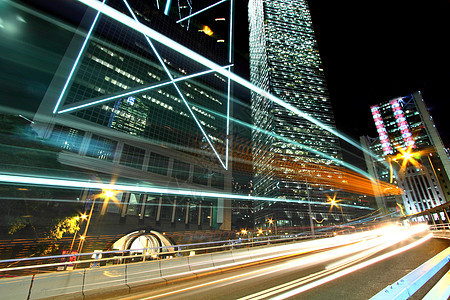 夜间通过香港市中心进行交通往来辉光速度城市公共汽车运动市中心街道场景景观运输图片