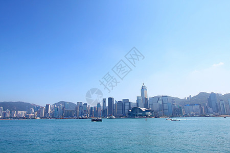 香港沿海岸线的天际线渡船摩天大楼商业天空景观蓝色晴天旅行全景建筑图片