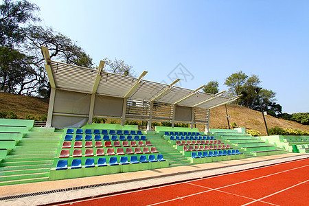 体育场座席和运行轨道椅子团体观众跑步扇子座位大堂足球运动空白图片
