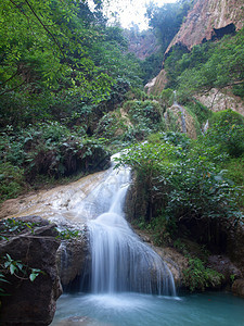 埃拉万瀑布国家植物岩石小溪河道地面公园避难所运河丛林图片