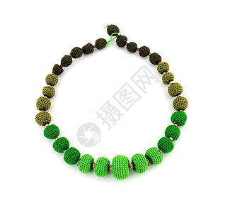 装饰珠白色针织缝纫绿色珠子棕色珠宝圆形派对背景图片