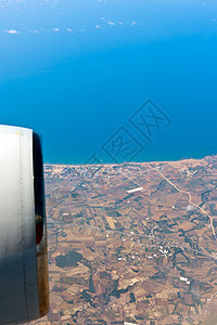 查看飞机的左舷洞飞行风景天气地平线海洋地球海浪航班高度天空图片