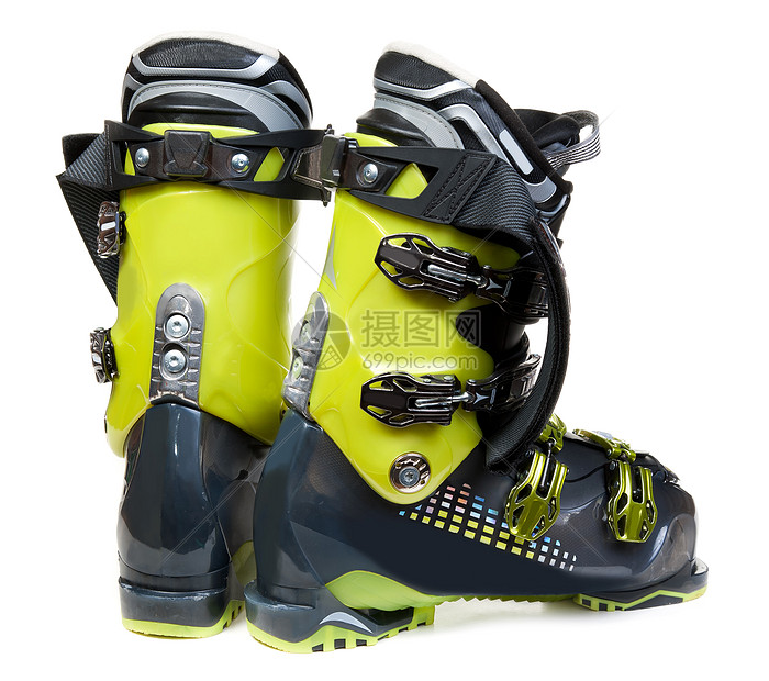双绿色绿色滑雪鞋追求激流娱乐运动爬坡塑料旅行带子靴子回旋图片