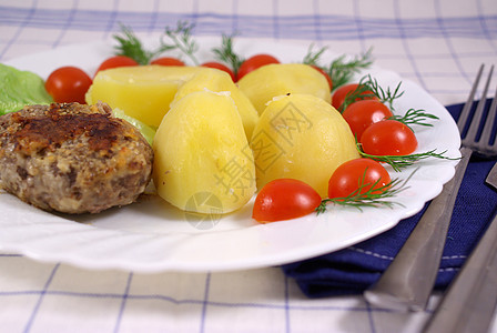 煮土豆愿望切菜蓝色厨房服务青菜桌子食物庆典盘子刀具蔬菜图片
