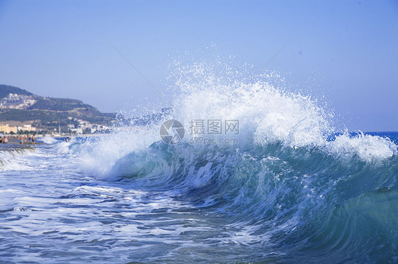 泡沫蓝色大浪旅行闲暇旅游海洋阳光支撑气候海岸线天空享受图片