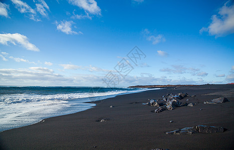 带黑沙的外海沙滩支撑情调冲浪热带天空海景海浪海岸土地火山图片