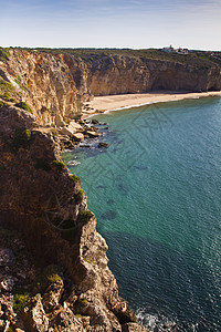 沙格里斯美丽的海滩岩石海岸线蓝色海浪晴天海岸旅行支撑海洋天空图片