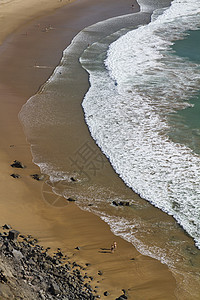 沙格里斯美丽的海滩海岸旅行支撑悬崖岩石海洋海浪晴天海岸线图片