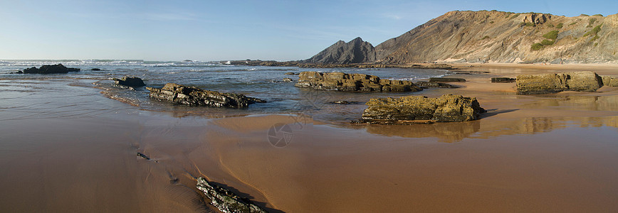 沙格里斯美丽的海滩海浪海岸线蓝色悬崖晴天海洋海岸岩石支撑天空图片