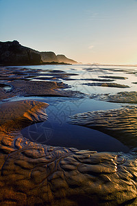 沙格里斯美丽的海滩水池支撑旅行海岸线天空海浪晴天海岸蓝色日落图片