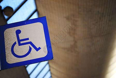 残疾人标志储备金轮椅停车场符号残障标识公园民众裙子人士图片