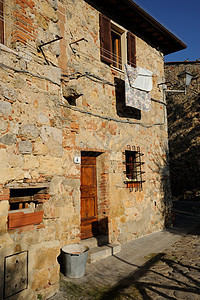 典型的Tuscan石屋广场铺路庭院建筑学车道石头鹅卵石街道人行道乡村图片