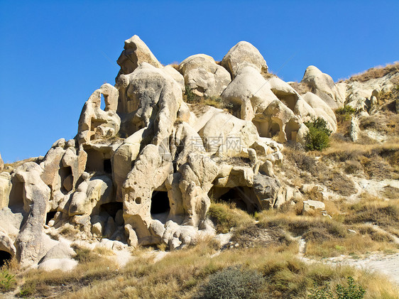 卡帕帕多西亚房子火鸡火山砂岩历史天空蓝色石头洞穴编队图片