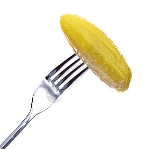 叉子上的Dill Pickle杂货小吃服务盘子照片黄瓜调味品别针美食美味图片