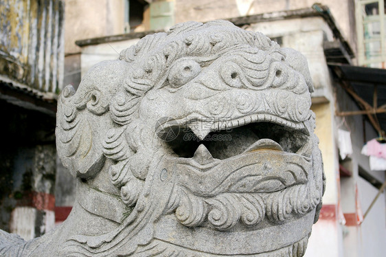 中国狮子雕像历史城市遗产宗教天空游客文化石头蓝色场景图片