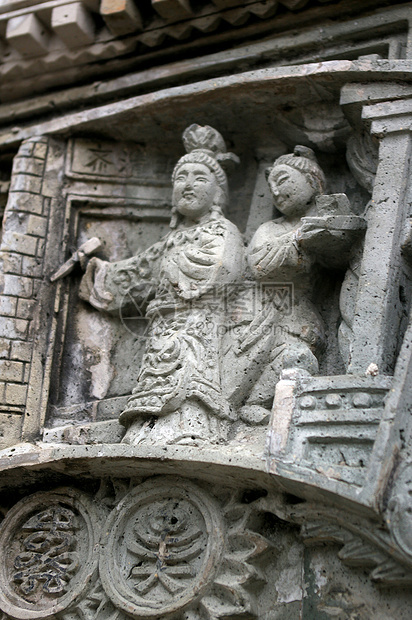 寺庙外的中国雕刻冥想雕像废墟上帝古董金子文化历史艺术传统图片