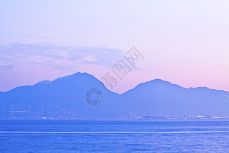 日落山脉天空反射地形太阳爬坡日落蓝色石头支撑风景图片