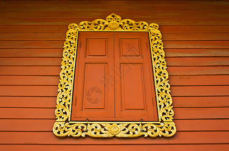 泰国曼谷泰国寺庙古金雕刻木窗(泰国曼谷)图片