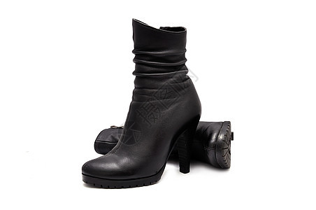 妇女靴子黑色衣服拉链皮革高跟鞋图片