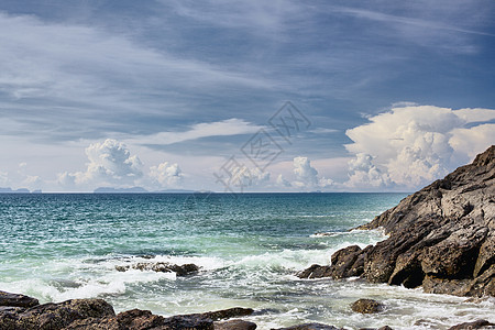 落岩海岸海浪碎石阳光热带海岸线照片旅行石头自然岩石图片