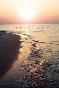 海海滩支撑海岸线阳光日出海浪天空边缘地平线日落背景图片