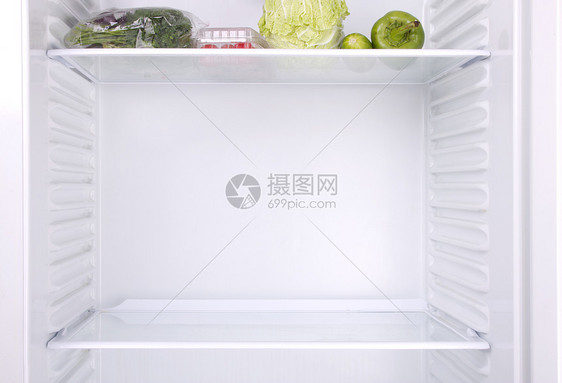 半空冰箱胡椒黄瓜架子烹饪柠檬晚餐瓶子绿色营养食物图片