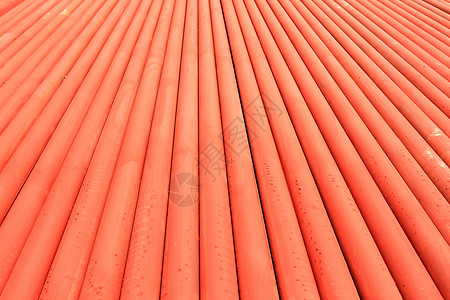 建筑工地的金属管堆积建造管道金属工业气体红色工程圆形图片