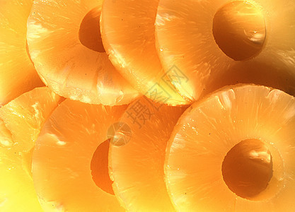 黄罐头菠萝环 素食生活方式水果菠萝黄色戒指食物圆圈横截面图片