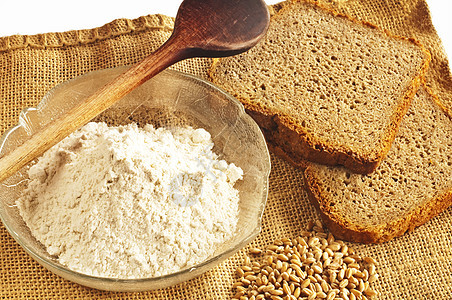 带面粉的全谷物面包晚餐健康粮食烘烤纤维饮食小吃捣蛋玉米玻璃背景图片