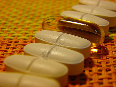 不同的药丸能让你感觉好一点白色药品胶囊饮食营养凝胶病人绿色活力药片背景图片