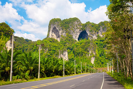 泰国公路网泰国高速公路蓝色小路太阳叶子森林照片天空晴天场景土地图片