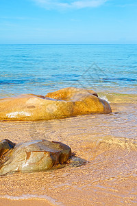 海中的石石墙纸蓝色地平线海景岩石射线海岸线支撑美丽卵石图片