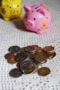 硬币储蓄货币存钱罐狮子粉色经济黄色图片