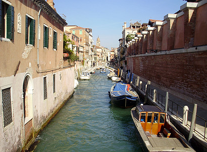 意大利威尼斯的运河文化船只目的地地方运输旅游码头阳光旅行图片