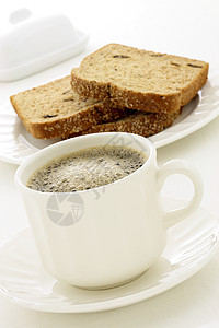 美味的清鲜新鲜早餐热咖啡奶制品燕麦黄油果汁水果葡萄干酸奶浆果坚果图片
