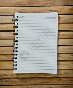 开放笔记本教育办公室床单硬木学习卷曲笔记文档商业木头图片