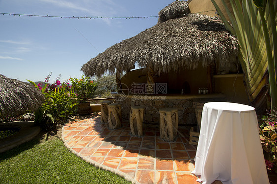 墨西哥热带度假胜地的酒吧游泳池草屋结构建筑小屋涟漪摄影阴影泳池色彩图片