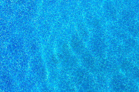 游泳池的水浪模式  背景情况色彩液体水池海浪波浪水面反射场景波纹图片