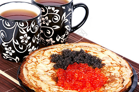 茶和鱼子酱煎饼早餐煎饼黄色营养蛋糕美食棕色糕点小吃甜点图片