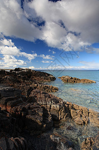 苏格兰高地海滩海岸岩石蓝色假期旅行顶峰阳光农村晴天太阳图片