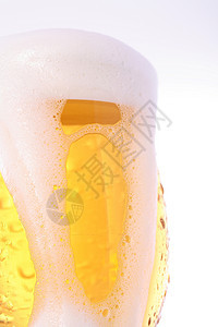 杯啤酒 特制白色金子液体黄色宏观飞沫玻璃泡沫酿造饮料图片