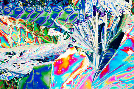 极化光束中的Tartaric酸晶体照片水晶实验食物宏观微晶光谱代理人鞑靼光谱色图片